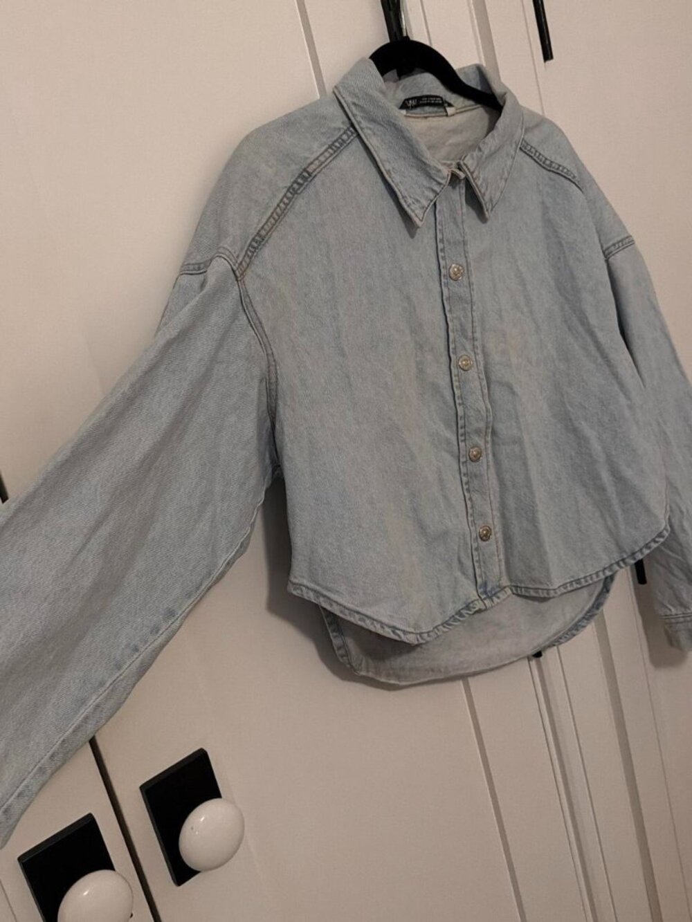 Light blue denim shirt with a relaxed fit